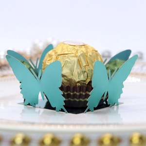 Teal laser-cut butterfly chocolate holder for festive wedding party decoration