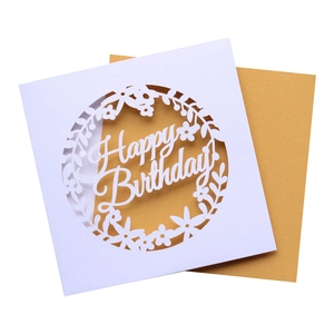 Detailed laser-cut white floral birthday card with premium golden metallic inner lining