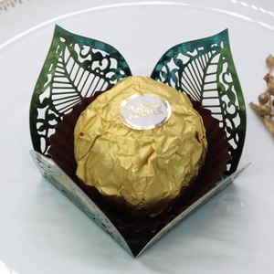 Detailed laser-cut dark green hollow leaf candy holder for Ferrero Rocher chocolates
