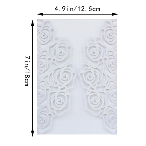 Detail of white laser-cut rose patterns on invitation cover with size dimensions