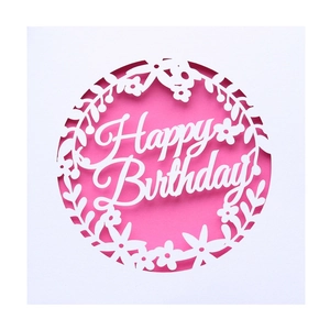 Detail of laser-cut Happy Birthday card with floral wreath design and pink liner