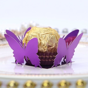 Laser cut purple butterfly paper holders for chocolates and party favors decoration