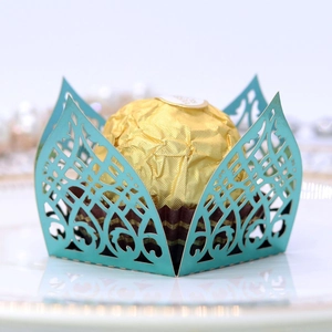Detailed laser-cut European floral pattern on tiffany blue candy box wrapping paper