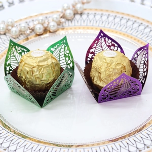 Detailed laser-cut leaf pattern hollow chocolate wrapper in metallic purple and green colors