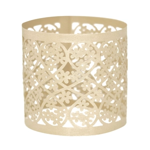 Detail of laser-cut pearl paper napkin ring with intricate floral lace pattern for weddings