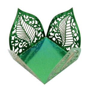 Metallic green laser-cut leaf chocolate wrapper with elegant hollow vein details