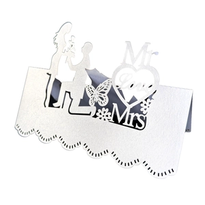 White laser cut heart table cards with butterfly and Mr & Mrs silhouette for weddings