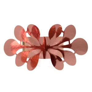 Detailed view of laser-cut rose gold glitter paper napkin ring in elegant butterfly shape