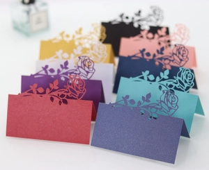 Laser cut rose hollow place cards in multiple colors for wedding table settings
