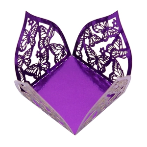 Detailed laser-cut butterfly pattern on metallic purple wedding favor candy box
