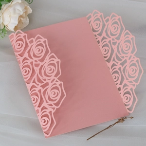 Pink laser-cut rose invitation cover with floral pattern for weddings and engagements
