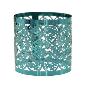 Detailed teal laser-cut napkin ring featuring intricate floral patterns and geometric hollows