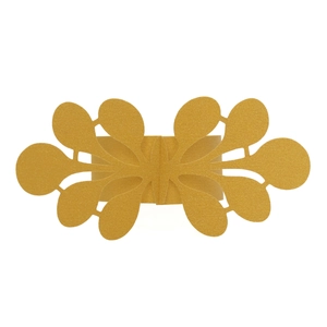 Golden pearlescent paper napkin rings with laser-cut lace pattern for wedding decorations
