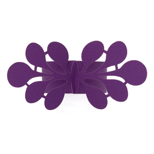 Detailed laser-cut purple napkin ring with intricate floral patterns for weddings