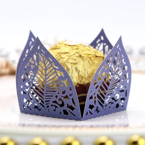 Deep purple laser-cut hollow leaf candy box with golden chocolate inside for parties