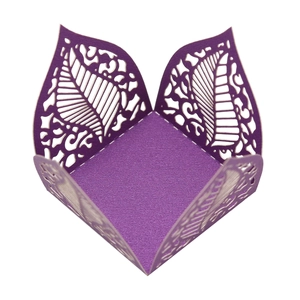 Detailed laser-cut purple hollow leaf pattern on candy box packaging for weddings