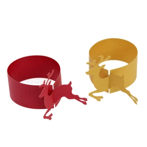 Golden and red reindeer laser-cut paper napkin rings for Christmas table decor