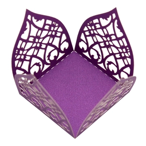 Elegant purple pearl paper candy box with laser-cut hollow pattern for wedding favors