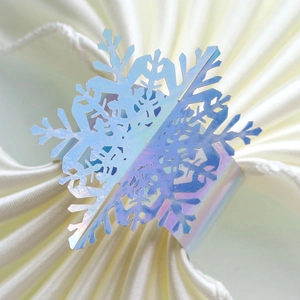 Iridescent snowflake napkin ring with holographic finish for Christmas table decor
