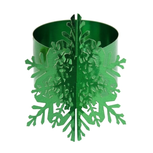 Detail of a metallic dark green snowflake napkin ring with a 3D festive design