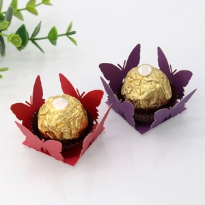 Laser-cut butterfly paper liners for chocolate decoration in red and purple pearlescent finish