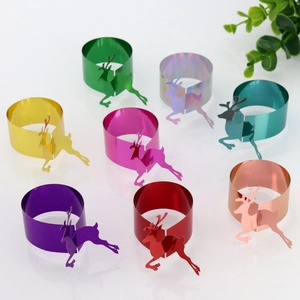 Set of eight metallic reindeer napkin rings in various vibrant colors for Christmas