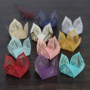 Detailed laser-cut hollow leaf design on pearl paper candy gift boxes in assorted colors