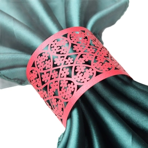 Elegant red laser-cut floral paper napkin rings for wedding table decorations