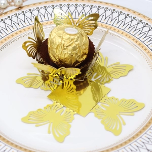 Detailed laser-cut gold butterfly chocolate paper wrapping for elegant party favors