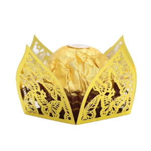 Laser cut butterfly candy box in gold pearlescent paper for wedding chocolate favor