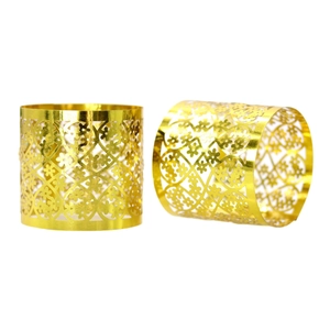 Golden mirror finish napkin rings with intricate floral lace pattern for hotel dining table