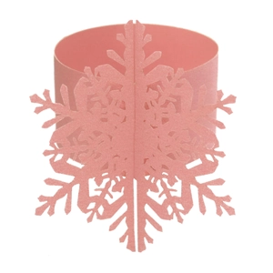 Detailed view of pink laser-cut snowflake napkin ring made of pearlescent paper