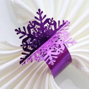 Purple snowflake paper napkin rings with mirror finish for elegant Christmas table decor