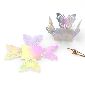 Detailed laser-cut butterfly candy box with iridescent holographic gradient finish