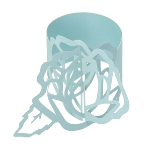 Detail of light blue laser-cut paper napkin ring with intricate rose flower design
