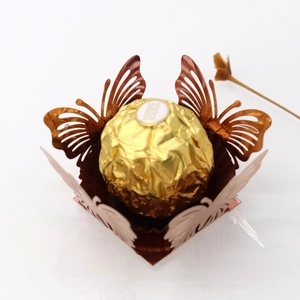 Detailed laser-cut butterfly chocolate wrapper with gold hollow lace for wedding favors