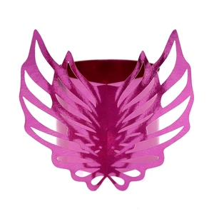 Macro detail of laser-cut fuchsia paper napkin ring with shimmering angel wing design