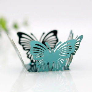 Elegant teal hollow butterfly favor box with laser cut floral patterns for weddings