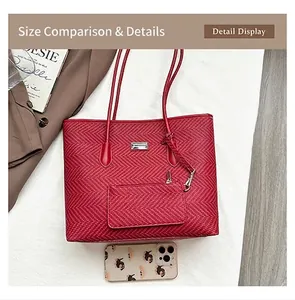 Detail view of red chevron woven tote bag with a matching detachable coin purse