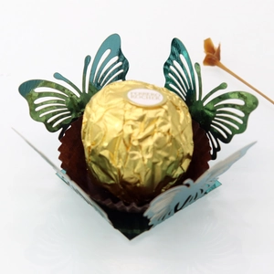 Detailed laser-cut dark green butterfly chocolate box with metallic pearlescent finish