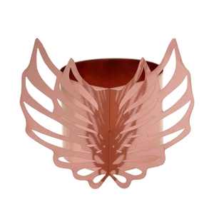 Detailed view of rose gold laser-cut angel wing napkin ring with hollow design