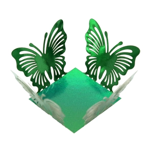 Detail of laser-cut butterfly wedding favor box in metallic emerald green finish