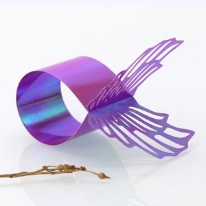 Iridescent purple butterfly napkin ring featuring detailed laser-cut hollow engraving