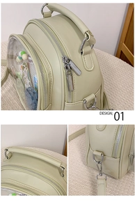 Detail view of mint green ita-bag with transparent window and silver metal buckles
