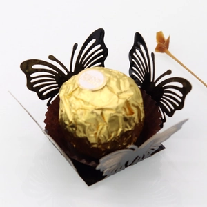 Detailed laser-cut butterfly chocolate holder for wedding party dessert table decoration