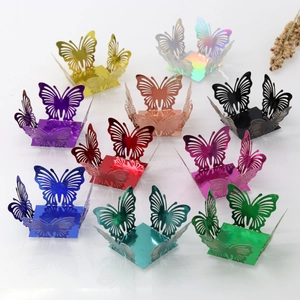 Flat lay of colorful butterfly hollow candy boxes in ten metallic shimmering shades