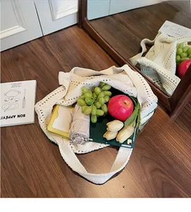 Detailed view of white woven tote bag interior showing large capacity for daily essentials