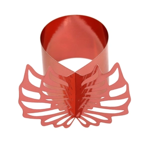 Close-up of red laser-cut hollow butterfly napkin ring with fine wing texture
