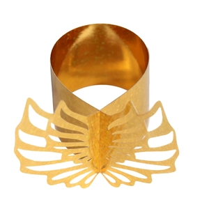 Detail of laser-cut glitter gold butterfly napkin ring with intricate wing patterns