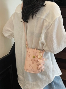 Pink faux leather crossbody phone bag with Keddy Bear print and cute bear charm pendant